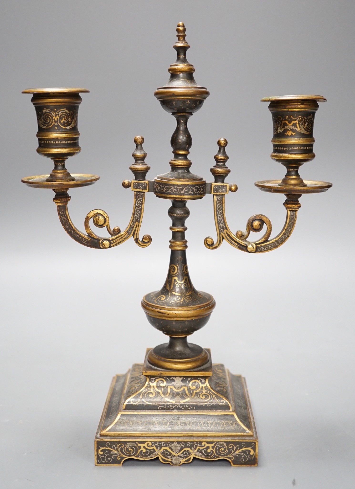 A French two branch niello work candelabrum, 16.5cms high